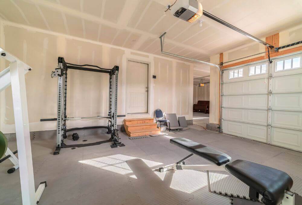 Different fitness equipment inside garage